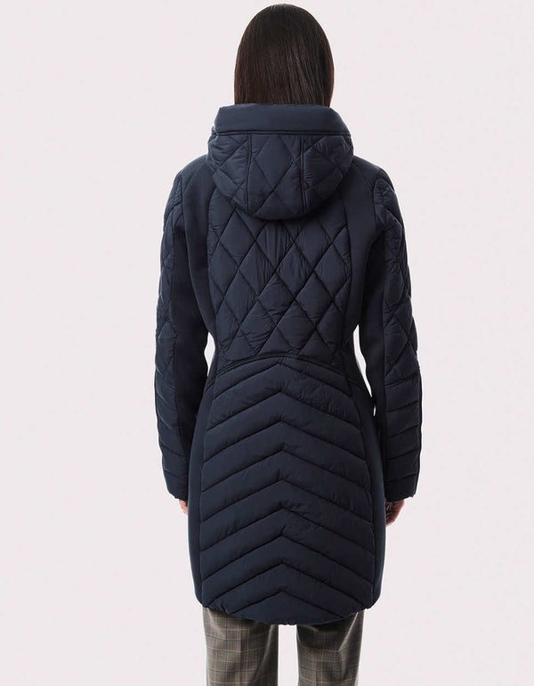 dark blue puffer jacket for women with vest thumbhole sleeves and eco friendly insulation for this winter 2023
