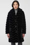 oversized vegan fur coat with tonal zigzag seams and angled hand pockets mid length design