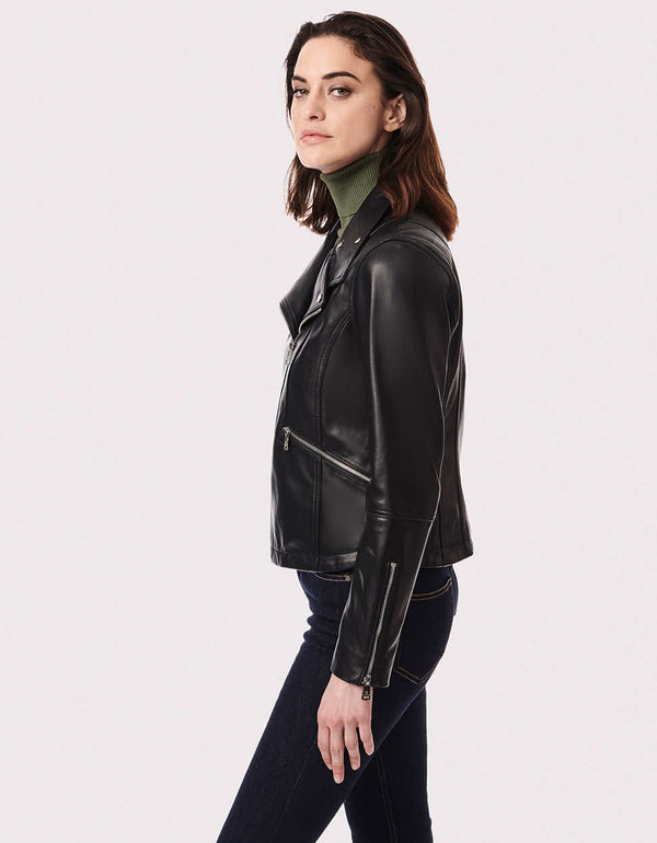 black cool jacket that is one of the essentials of a woman with a motorcycle or riding motos in 2023