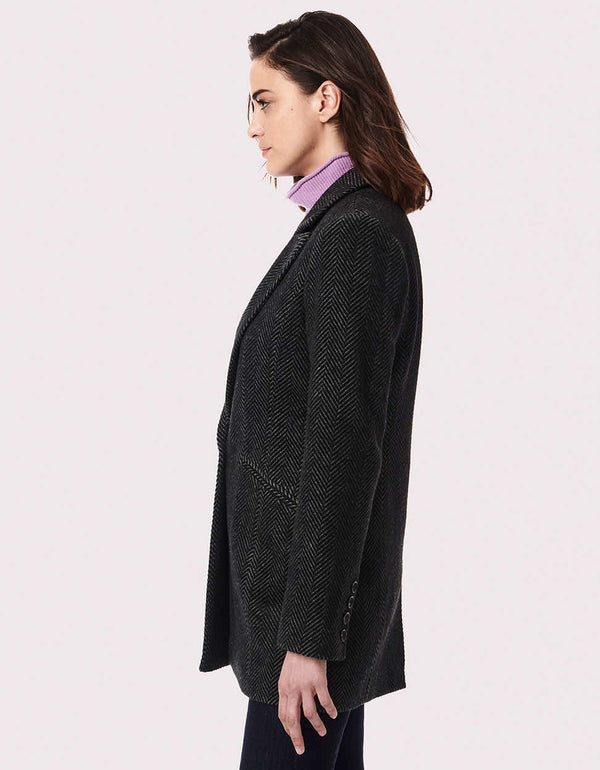 professional black herringbone blazer jacket for women with a classic structured style and welted hand pockets