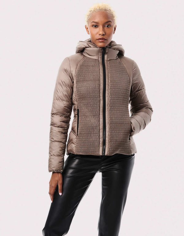slim fit hip length puff jacket for women with zip off bib and stylish hood that is removable