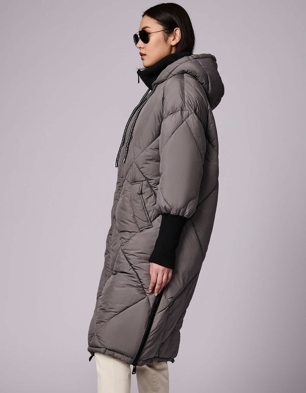 comfortable padded jacket for women with side vent zippers and chunky rope string to complete the ensemble