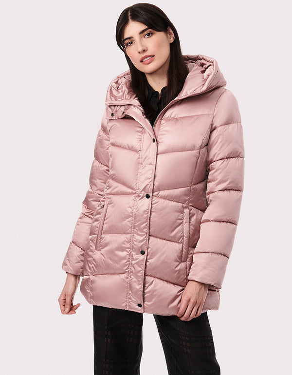 stay warm all winter in this womens puffer walker with sustainable style Unique quilting streamlines the waist