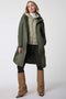 womens long length utility raincoat in sage green with water resistant outer layer material and ecoplume insulation