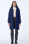 navy blue puffer jacket with a knee length cut and soft texture ideal for warmth and polished casual looks