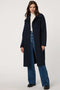 Women’s plaid wool coat with oversized calf-length fit, dramatic collar, and two-button single-breasted front.