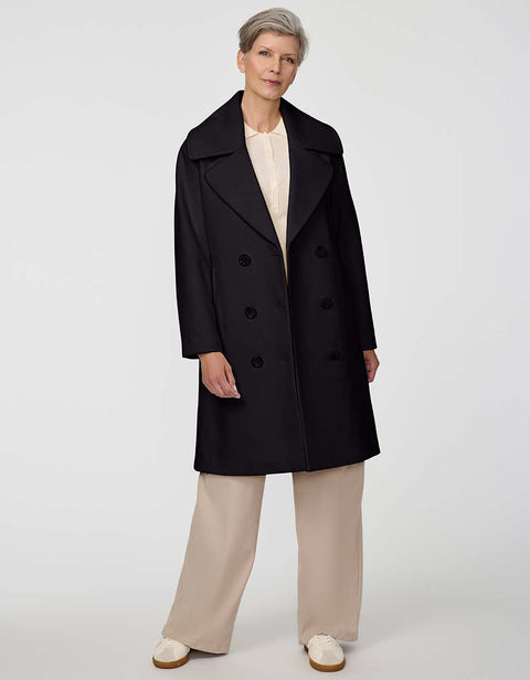 Calf-length double-breasted wool coat with oversized lapels, offering timeless sophistication and warmth.