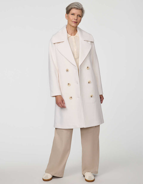 Calf-length double-breasted wool coat with oversized lapels, offering timeless sophistication and warmth.