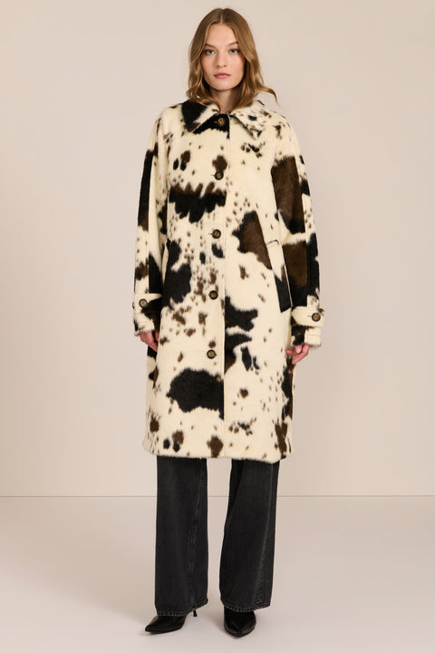 Women's faux calf hair car coat with oversized collar, button-front closure and cuff-tab details.