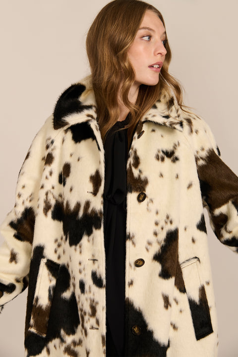 Women's faux calf hair car coat with oversized collar, button-front closure and cuff-tab details.