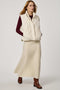 Women’s quilted puffer vest with oversized fit, funnel collar, zipper closure, and lightweight Ecoplume fill.