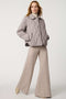 Classic quilted women’s puffer jacket with structured collar, snap closures, patch pockets, and Ecoplume fill.