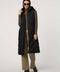 fashionable womans trendy puffer vest in black for winter season in a walker length with oversized fit for comfort