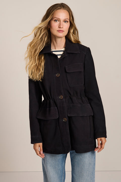 Women's genuine suede safari jacket with adjustable drawcord waist and four patch pockets.