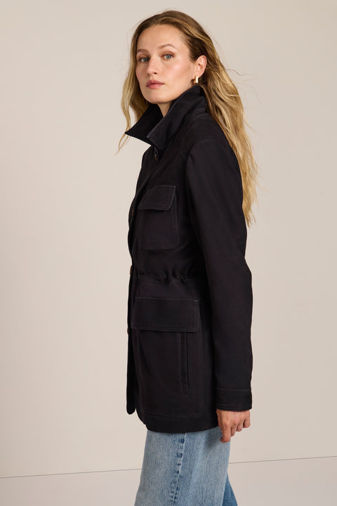 Women's genuine suede safari jacket with adjustable drawcord waist and four patch pockets.