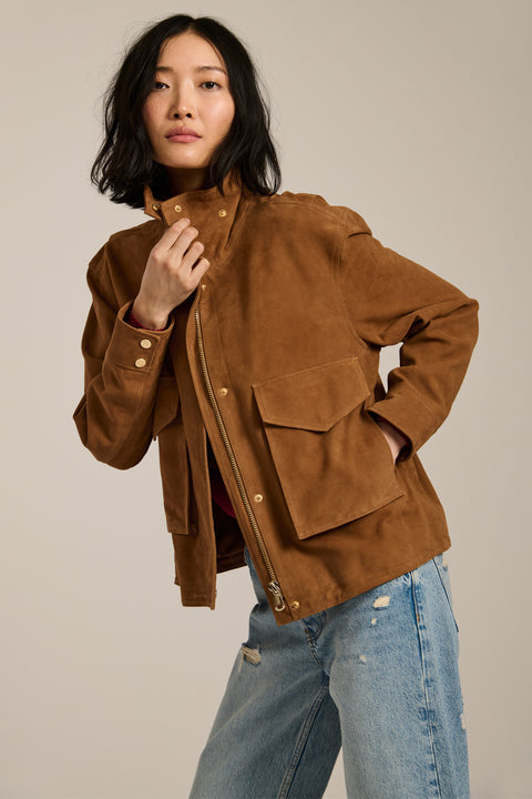 Women's genuine suede utility jacket with oversized flap pockets and stand collar in camel brown