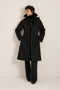 Women's belted raincoat with removable hood and water-repellent finish.
