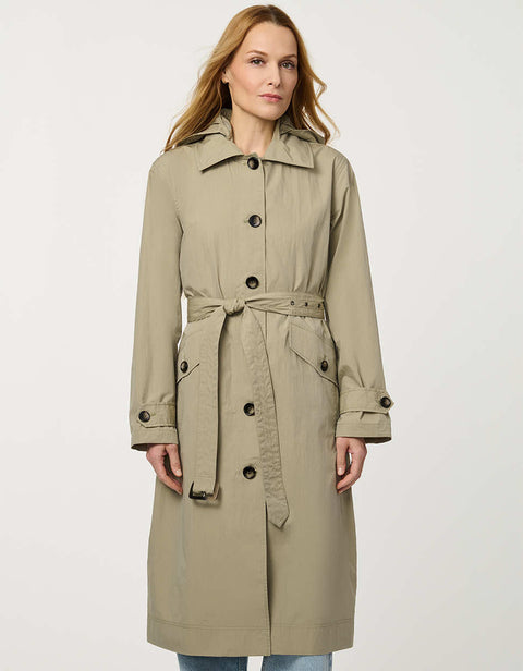 Women’s lightweight utility trench coat with belted waist, flap pockets, and roll-away hood tucked into the collar.