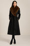 Long belted wool-blend coat with removable faux fur shawl collar, double-breasted front and tailored silhouette.