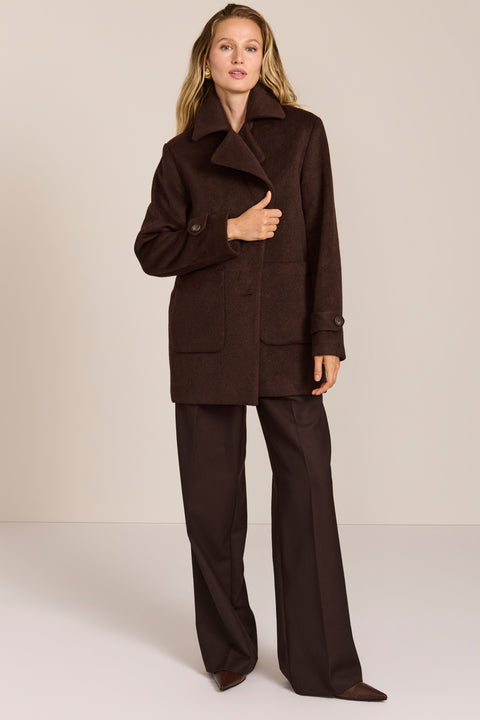 Women's chocolate brown oversized wool-blend coat with notched lapels, patch pockets and button-tab cuffs.