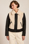 Women's faux shearling and faux leather jacket with zip front and oversized collar in ivory and black
