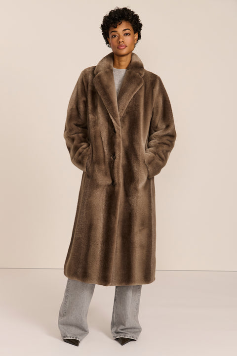 women's long taupe faux fur coat with a wide notched collar, single-breasted front, and side pockets.