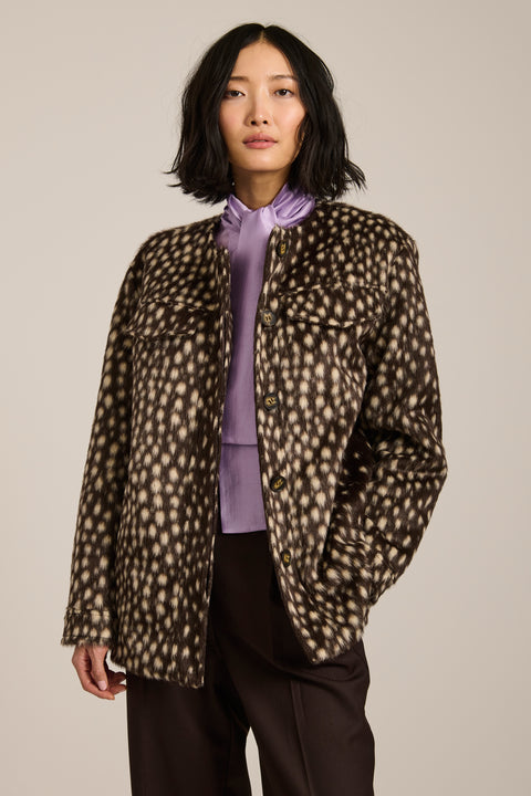 Bambi print faux calf hair utility jacket with collarless silhouette, flap pockets and relaxed fit.
