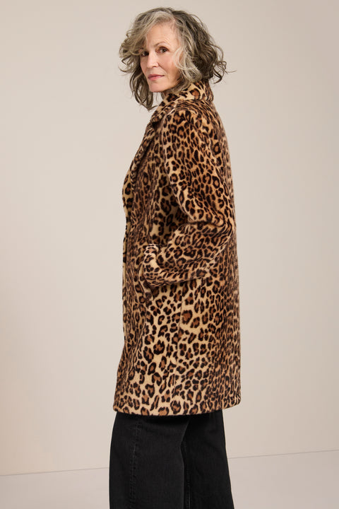 Leopard print faux fur tailored coat with notch lapels, single-breasted front and knee-length silhouette.