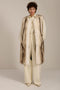 A frost-tipped faux fur long vest with collarless neckline, hook-and-eye closure and side seam pockets.