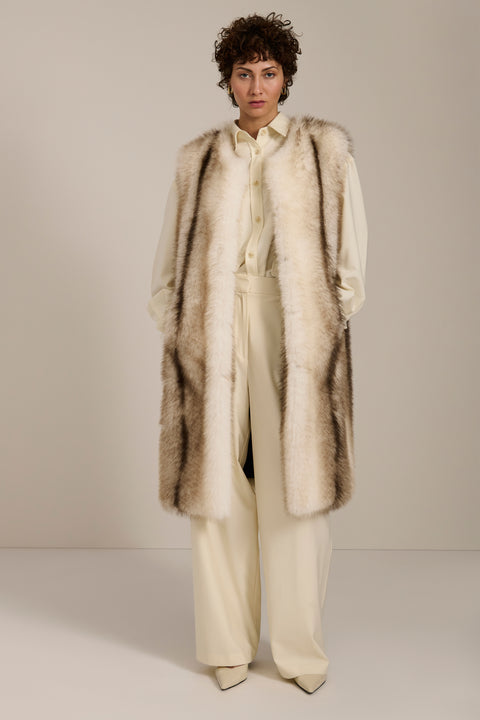 A frost-tipped faux fur long vest with collarless neckline, hook-and-eye closure and side seam pockets.