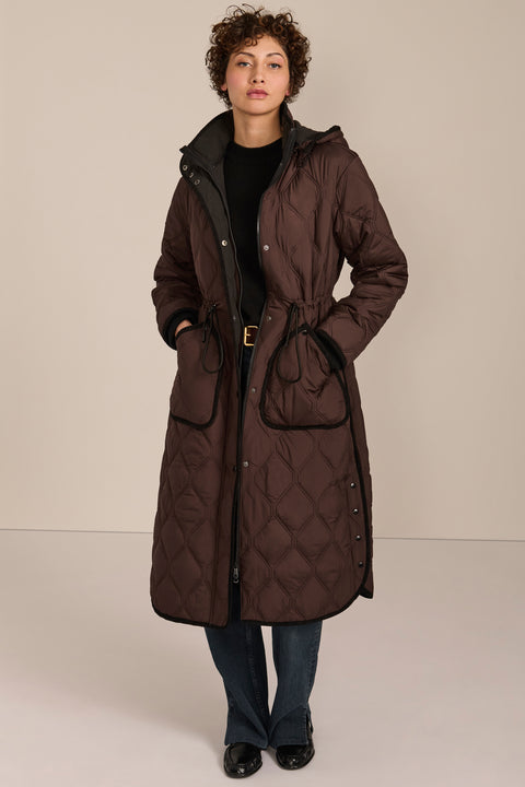 women's Long Quilted Puffer Coat with drawstring waist, hood, diamond quilting and longline silhouette.
