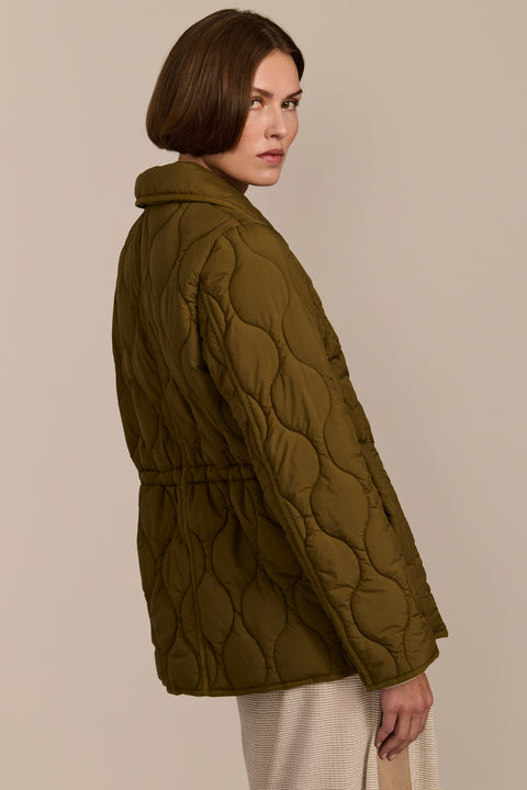 women's Quilted Jacket with onion quilting, pointed collar, button front and a softly shaped waist.