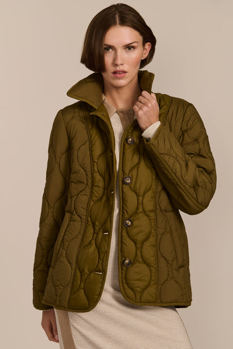 women's Quilted Jacket with onion quilting, pointed collar, button front and a softly shaped waist.