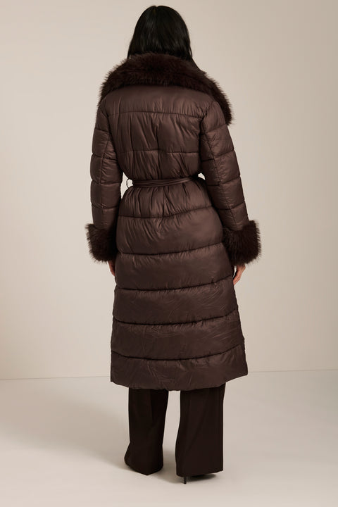 Full-length puffer coat with faux fur shawl collar, faux fur trim, self-tie belt and insulated design.