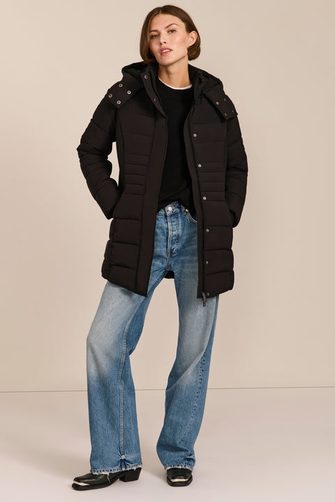 women's hooded puffer coat with horizontal quilting, flexible neoprene side panels, high collar and zip pockets.