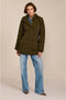 women's hooded puffer coat with horizontal quilting, flexible neoprene side panels, high collar and zip pockets.