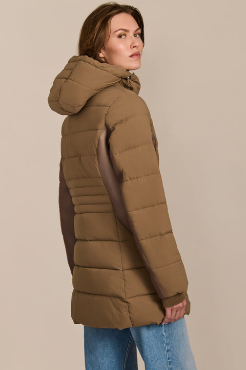 women's hooded puffer coat with horizontal quilting, flexible neoprene side panels, high collar and zip pockets.