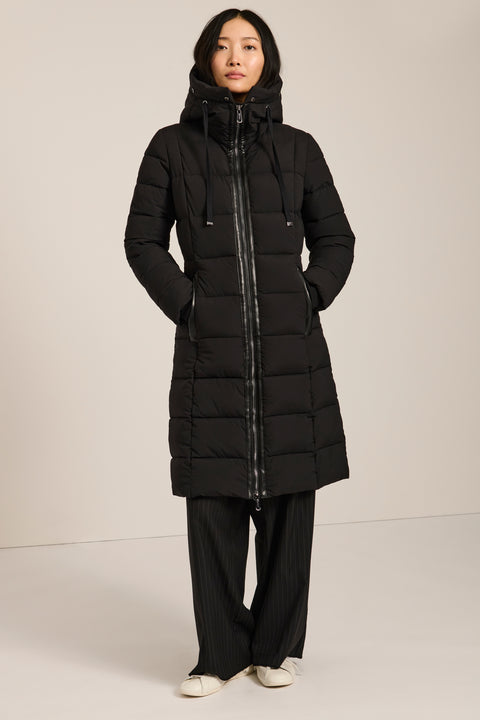 Mid-length hooded puffer coat with faux fur trim, faux leather trim, zip pockets and elastic back waist.