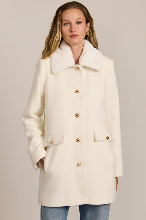 women's wool coat featuring a removable faux fur collar, gold-tone button-front closure and flap pockets.