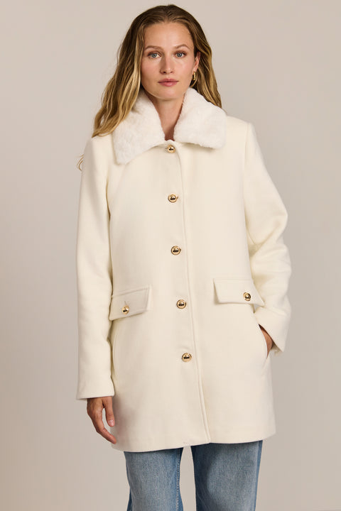 women's wool coat featuring a removable faux fur collar, gold-tone button-front closure and flap pockets.