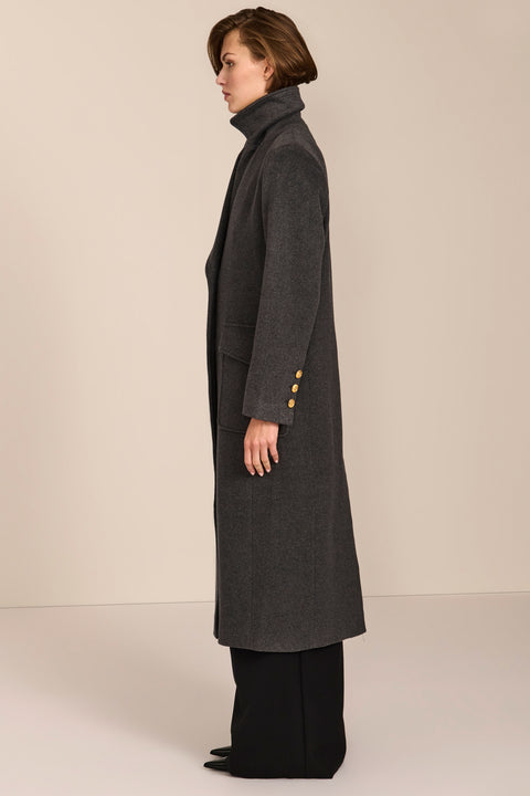 classic wool coat with calf length cut and patch pockets ideal for adding sophistication to everyday outfits