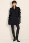 Women's double-breasted blazer coat with tailored lapels and mid-thigh silhouette.