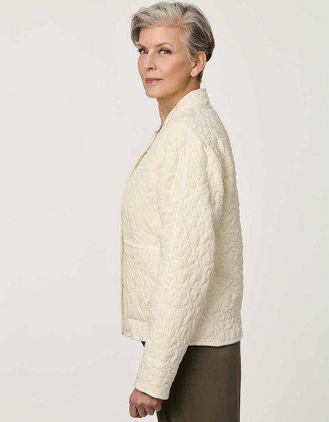 Women’s lightweight quilted jacket with jacquard quilting, tonal piping, and streamlined silhouette.
