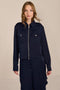women's navy satin-finish zip-front utility jacket with pointed collar, flap chest pockets and silver-tone hardware.