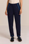Women's navy soft scuba pull-on pants with blue contrast piping, elastic waistband and tapered leg.