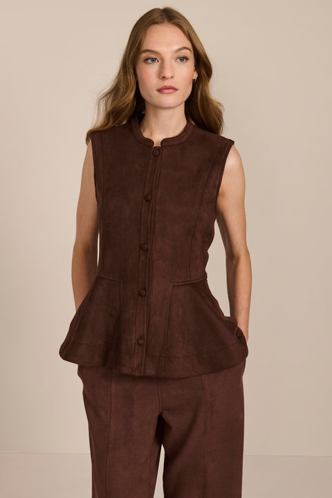 women's chocolate brown faux suede peplum top featuring a sleeveless silhouette, band collar, tonal covered buttons and flared hem.