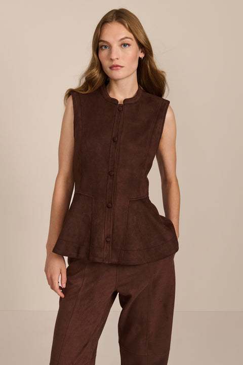 women's chocolate brown faux suede peplum top featuring a sleeveless silhouette, band collar, tonal covered buttons and flared hem.