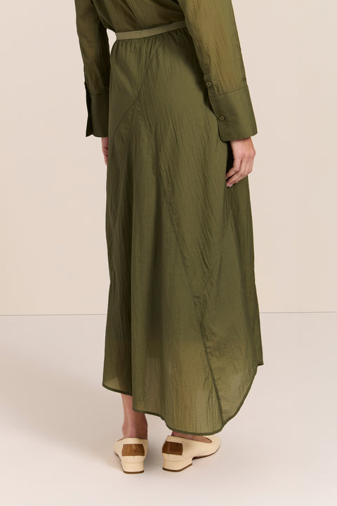 women's asymmetrical maxi skirt in olive green with a fluid silhouette and softly draped hem.