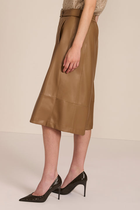 women's camel faux leather culottes featuring a high waist, self belt, wide cropped leg and paneled seam detailing.