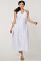 Women’s bright white stretch linen halter midi dress with button front and flowy skirt.